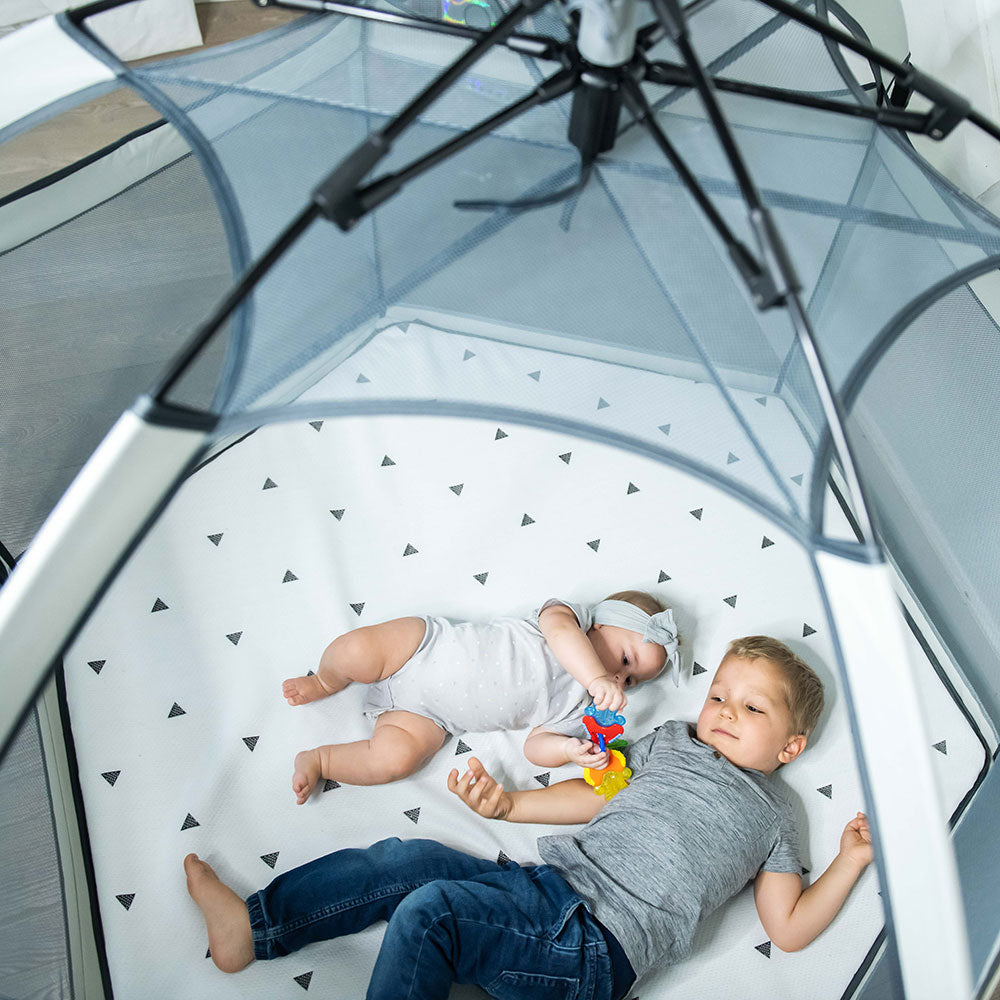 Baby playing inside Pop 'N Go Playpen lifestyle photo