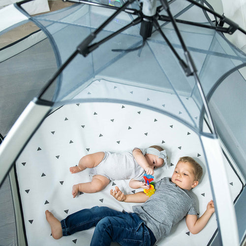 Baby playing inside Pop 'N Go Playpen lifestyle photo
